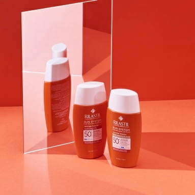 Rilastil Sun System Water Touch Солнцезащитный увлажняющий тонирующий флюид SPF 50+ 50 мл